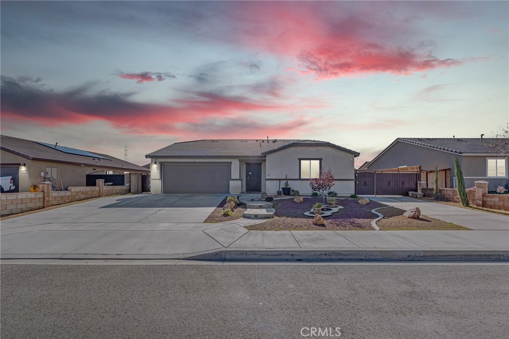 11409 Bellevue Street Adelanto, CA 92301 - Photo 1 of 49 a view of a house with sitting area and garden