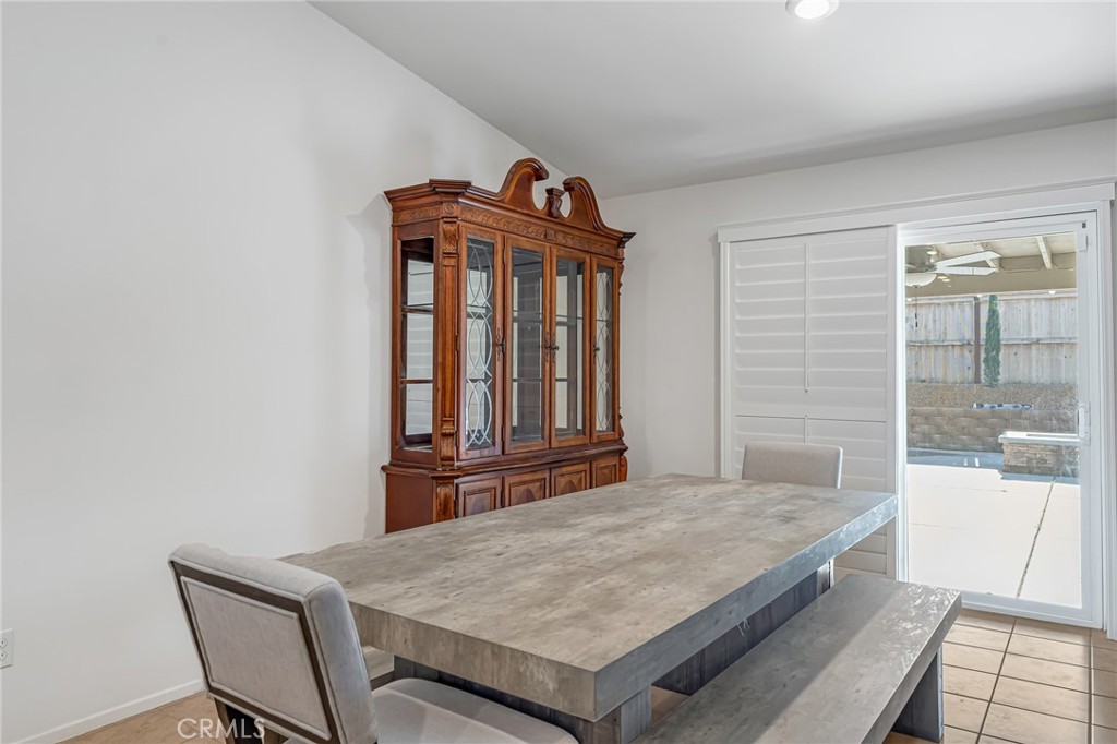 11409 Bellevue Street Adelanto, CA 92301 - Photo 29 of 49 a bedroom with a bed and a window