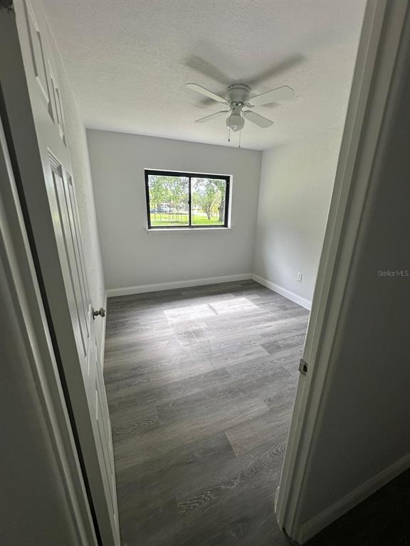4514 Arch Street Orlando, FL 32808 - Photo 12 of 21 an empty room with windows