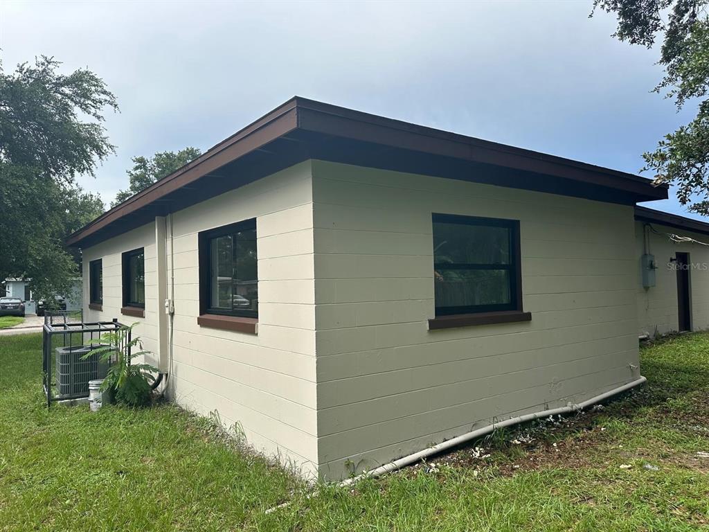 4514 Arch Street Orlando, FL 32808 - Photo 21 of 21 a front view of house with yard