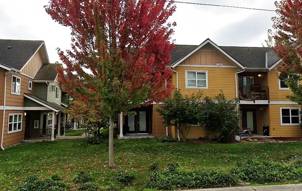 front view of a house with a yard