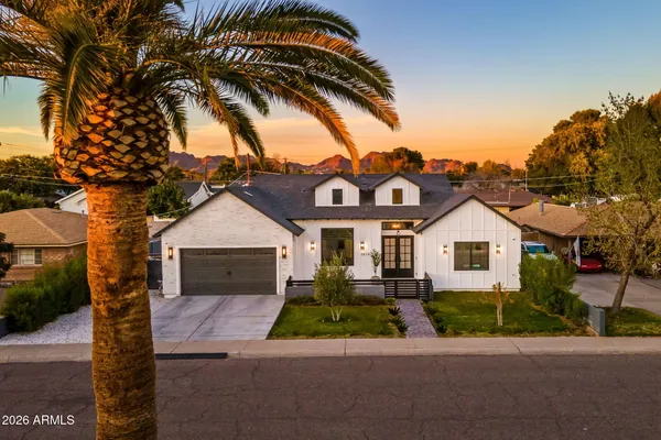 front view of a house with a small yard