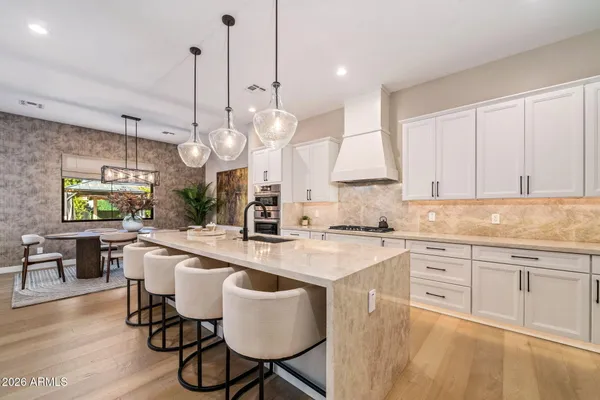 a living room with fireplace furniture and a flat screen tv