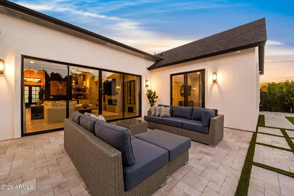 a outdoor living space with furniture and garden view