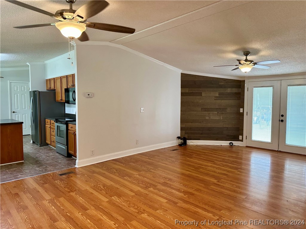 459 Nye Road Orrum, NC 28369 - Photo 18 of 25 wooden floor in an empty room with a window