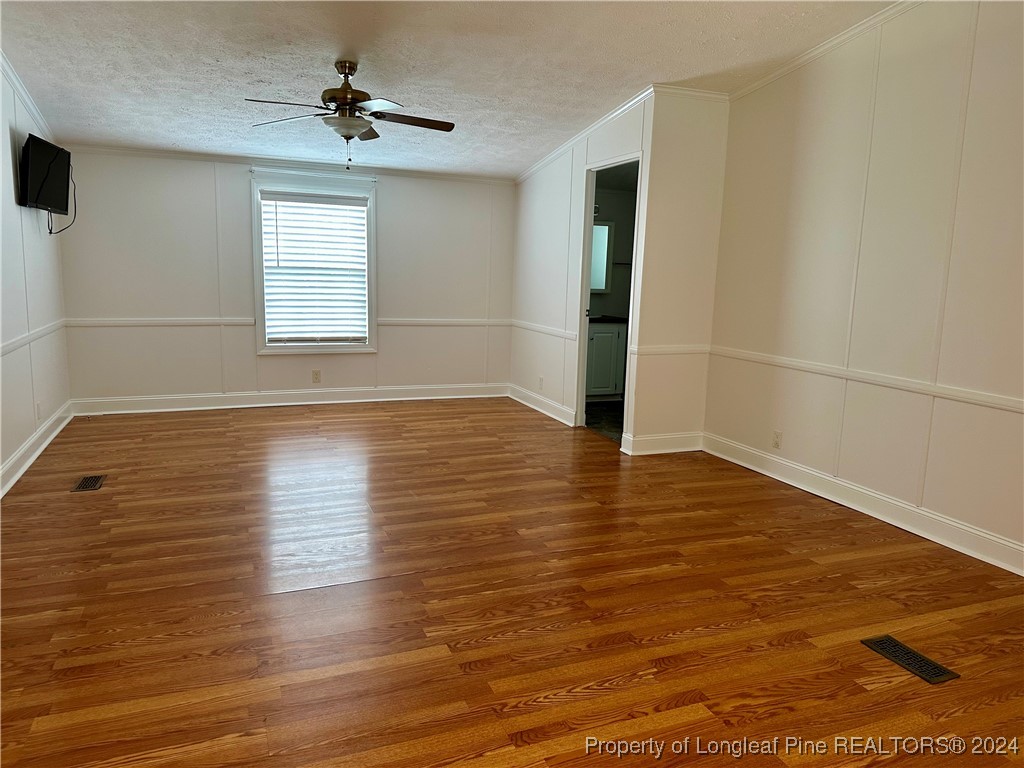 459 Nye Road Orrum, NC 28369 - Photo 21 of 25 wooden floor in an empty room with a window
