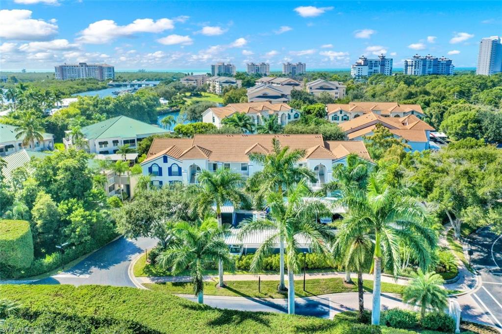 480 Bermuda Cove Way, Unit 1205 Naples, FL 34110 - Photo 3 of 33 a view of a garden
