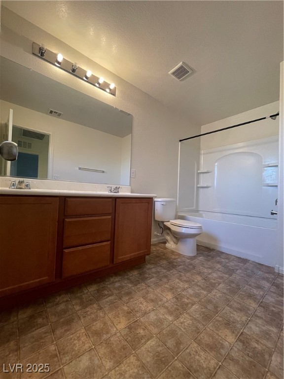 10632 Summerbell Street Las Vegas, NV 89179 - Photo 11 of 16 Bathroom featuring double vanity, bathtub / shower combination, and a textured ceiling