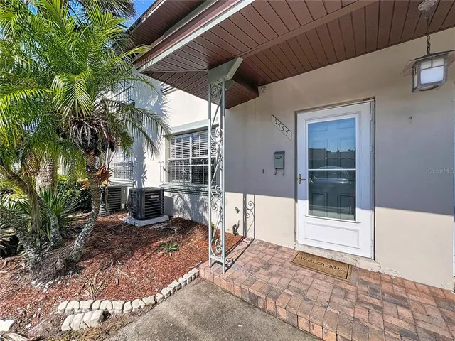 a view of a house with a patio