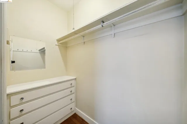 a bathroom with a shower and vanity