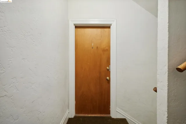 a view of front door with hallway