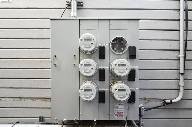 a view of a storage and utility area with a clock