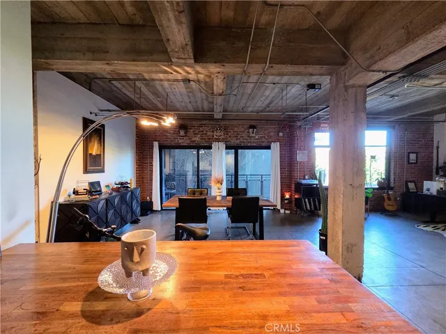 a bathroom with a double vanity sink toilet and shower