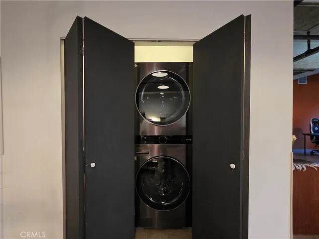 a patio table and chairs with an umbrella