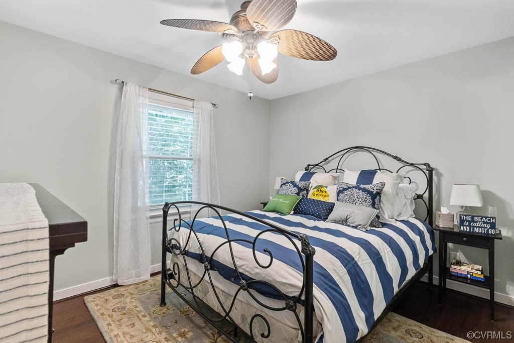14704 Acorn Ridge Place Midlothian, VA 23112 - Photo 13 of 17 a bed sitting in a bedroom next to a window