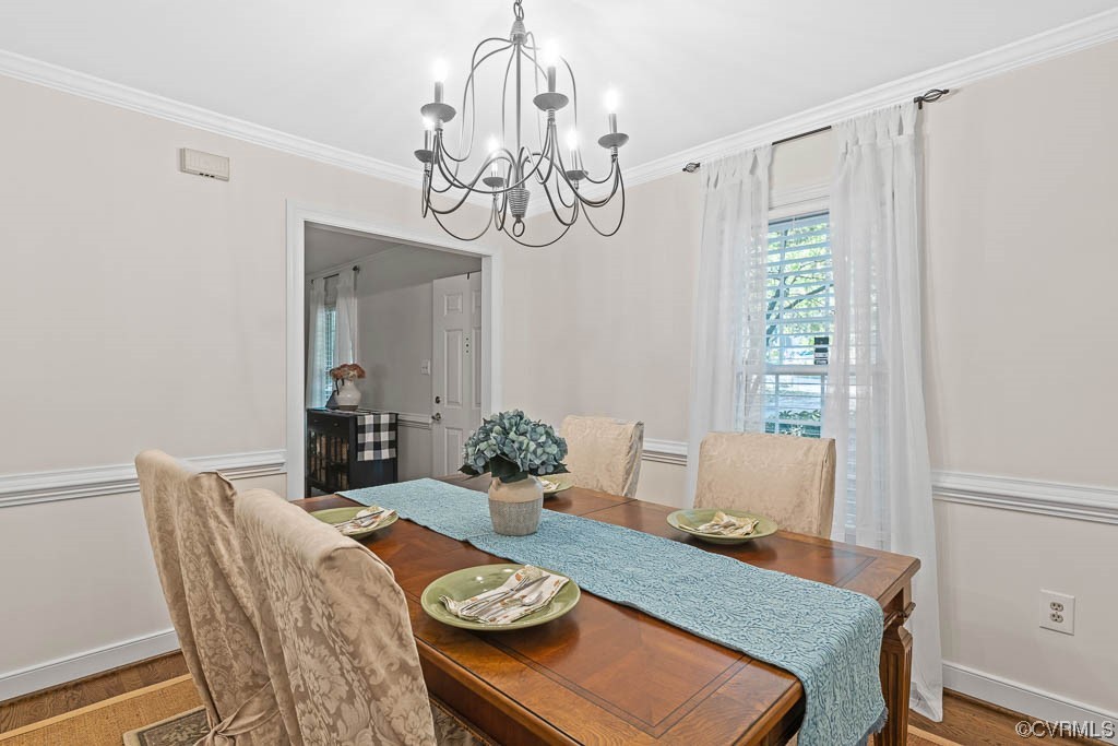14704 Acorn Ridge Place Midlothian, VA 23112 - Photo 5 of 17 a view of a dining room with furniture window and wooden floor