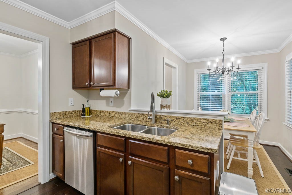 14704 Acorn Ridge Place Midlothian, VA 23112 - Photo 7 of 17 a kitchen with a granite countertop sink and cabinets
