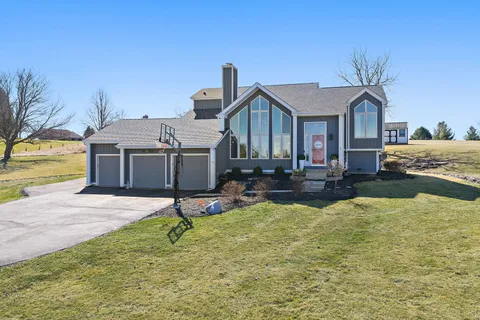 a house view with a swimming pool