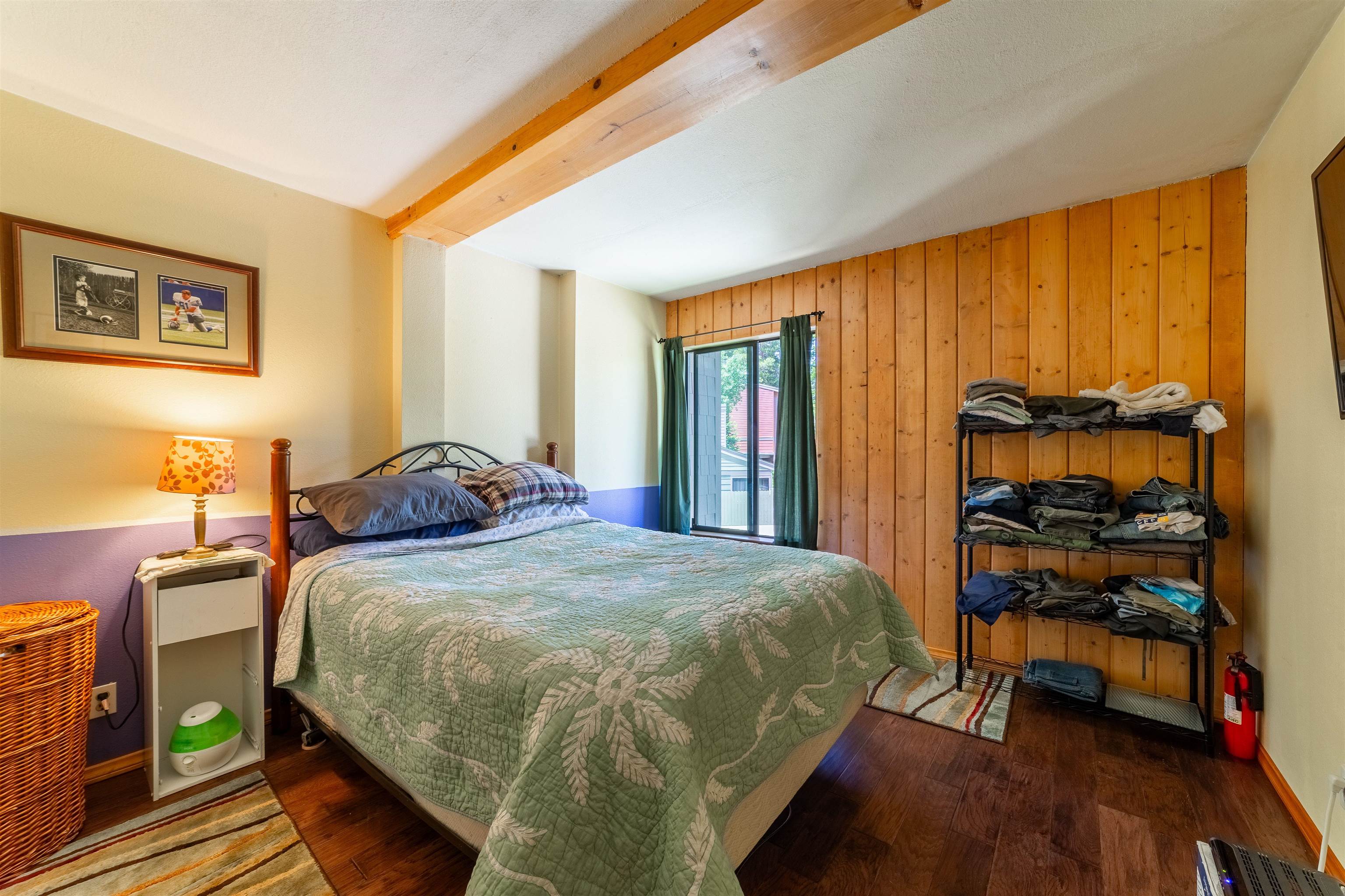 3253 Meridian Boulevard, Unit 214 Mammoth Lakes, CA 93546 - Photo 16 of 28 a bed room with a bed and a chair