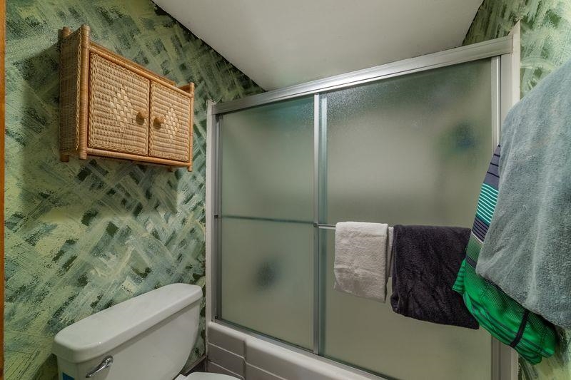 3253 Meridian Boulevard, Unit 214 Mammoth Lakes, CA 93546 - Photo 20 of 28 a bathroom with a toilet and a shower