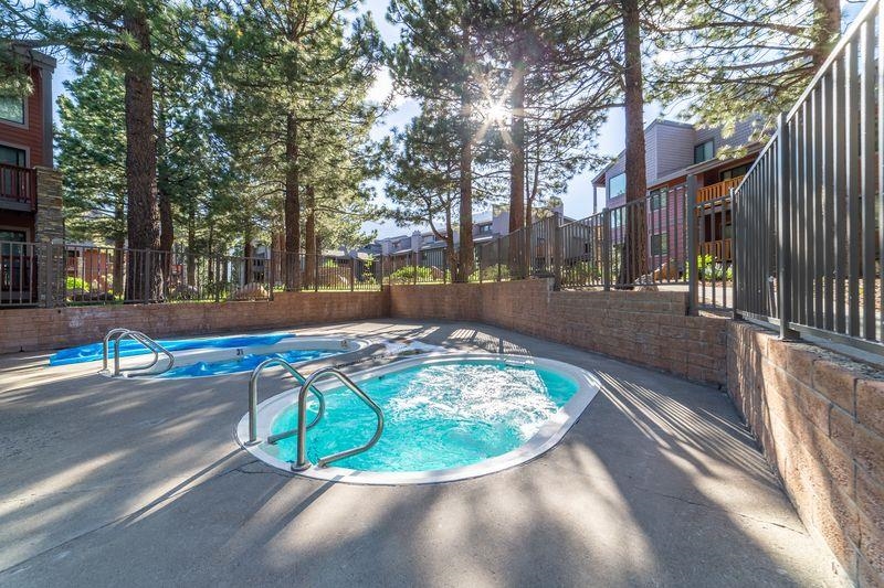 3253 Meridian Boulevard, Unit 214 Mammoth Lakes, CA 93546 - Photo 24 of 28 a view of a swimming pool with a patio