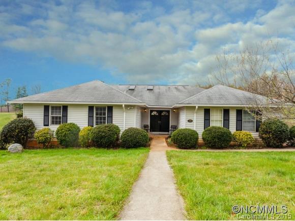 104 Hampton Road Leicester, NC 28748 - Photo 1 of 19 a front view of a house with garden