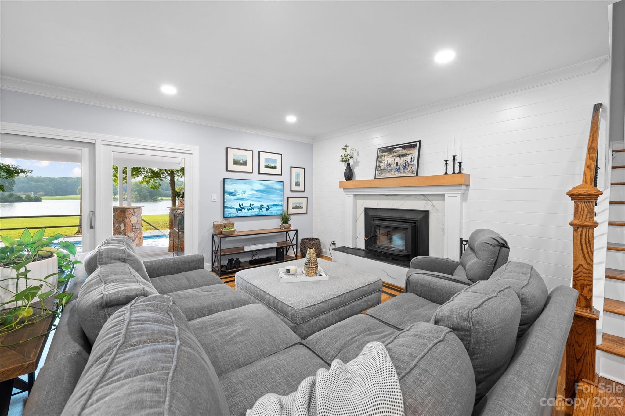 766 Eagle Road Waxhaw, NC 28173 - Photo 11 of 45 a living room with furniture and a fireplace