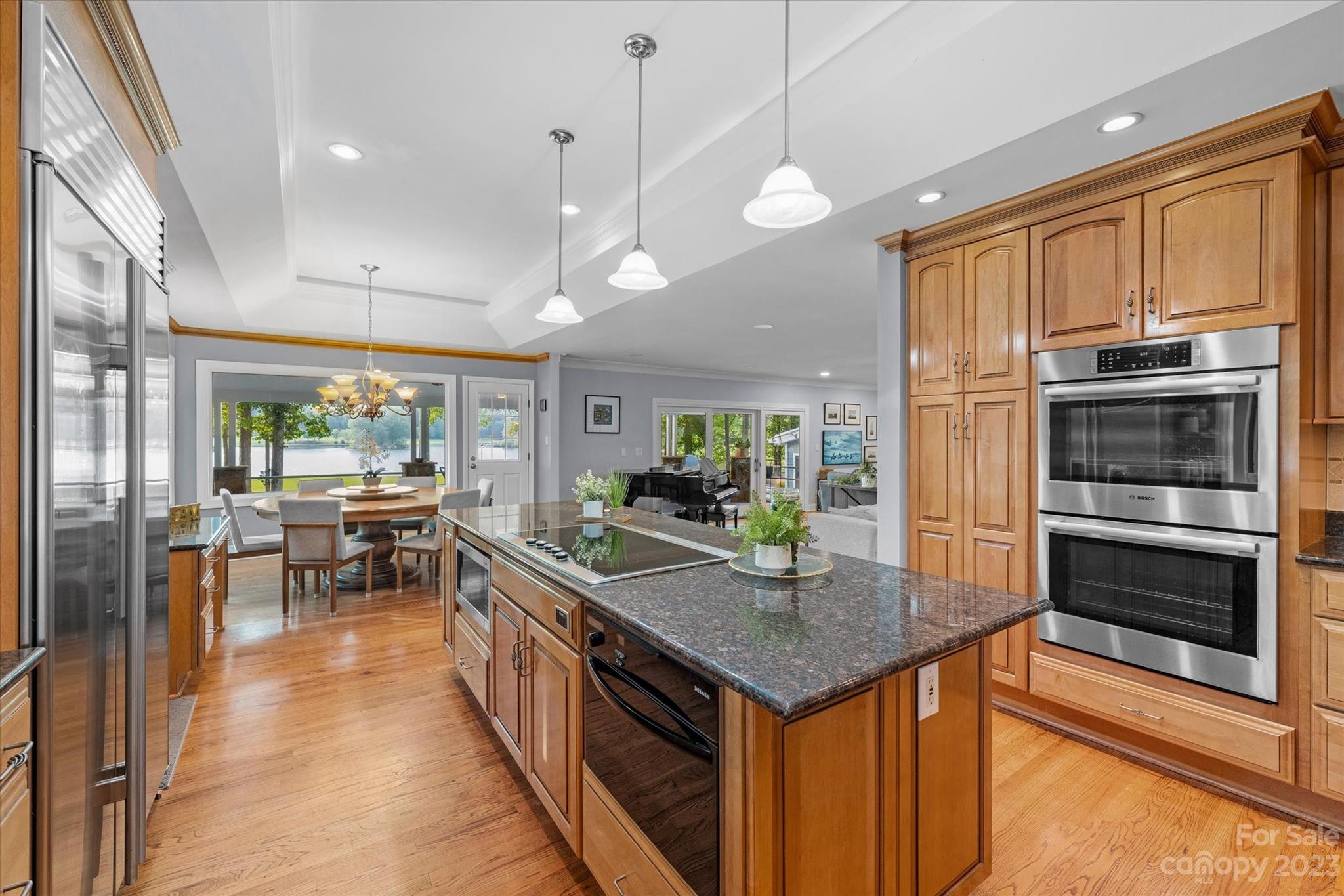 766 Eagle Road Waxhaw, NC 28173 - Photo 14 of 45 a kitchen with counter space and breakfast area