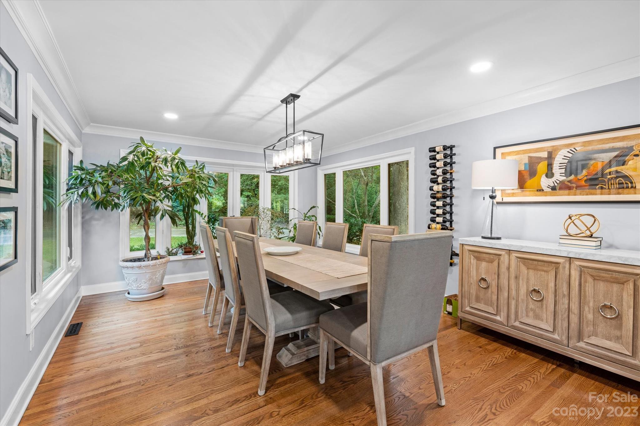 766 Eagle Road Waxhaw, NC 28173 - Photo 20 of 45 a view of a dining room with furniture window and wooden floor
