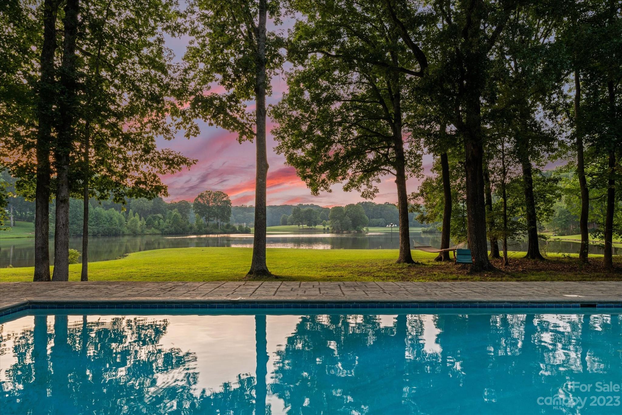 766 Eagle Road Waxhaw, NC 28173 - Photo 2 of 45 a view of an outdoor space and swimming pool