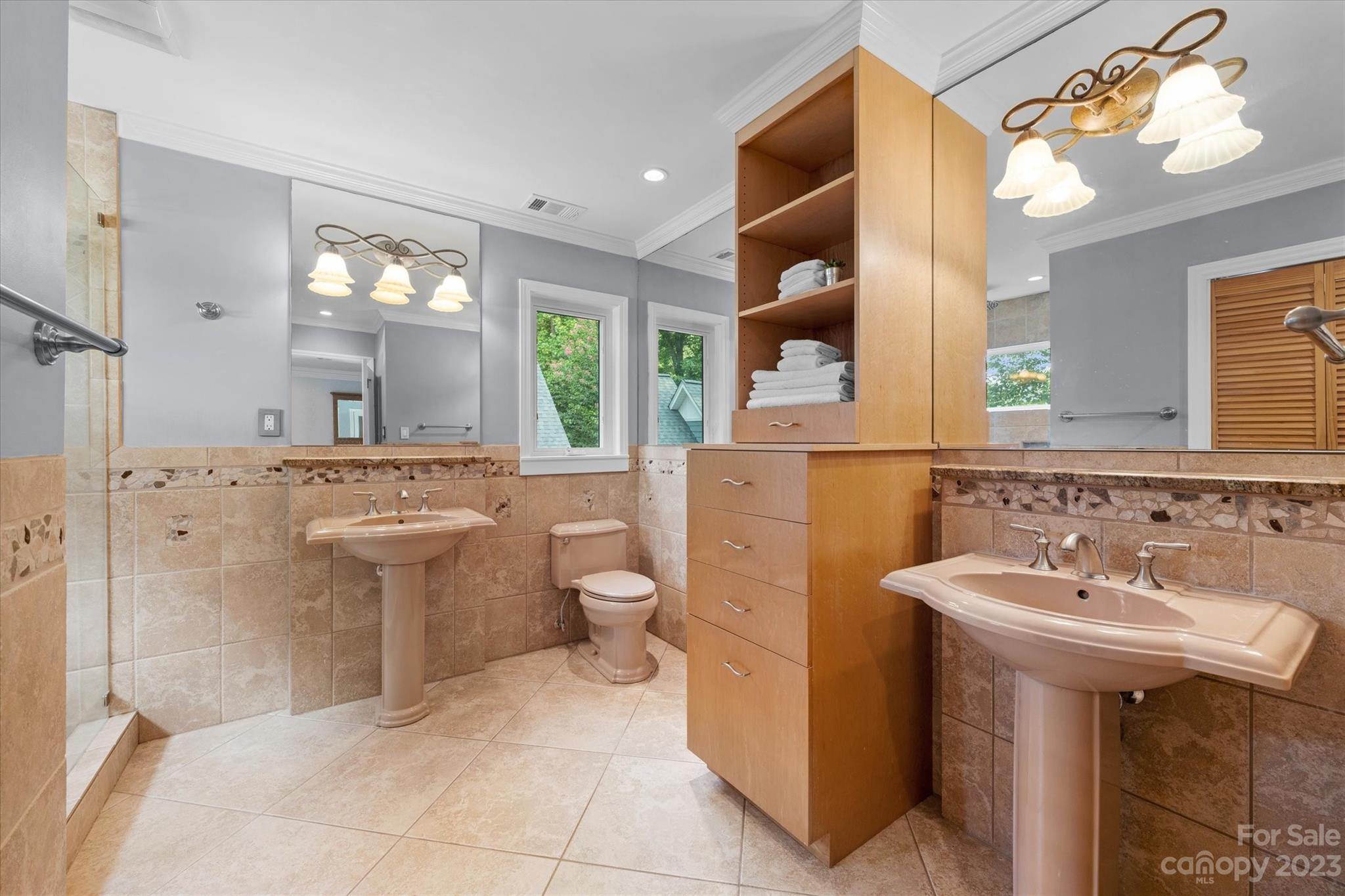 766 Eagle Road Waxhaw, NC 28173 - Photo 24 of 45 a bathroom with a sink toilet and mirror