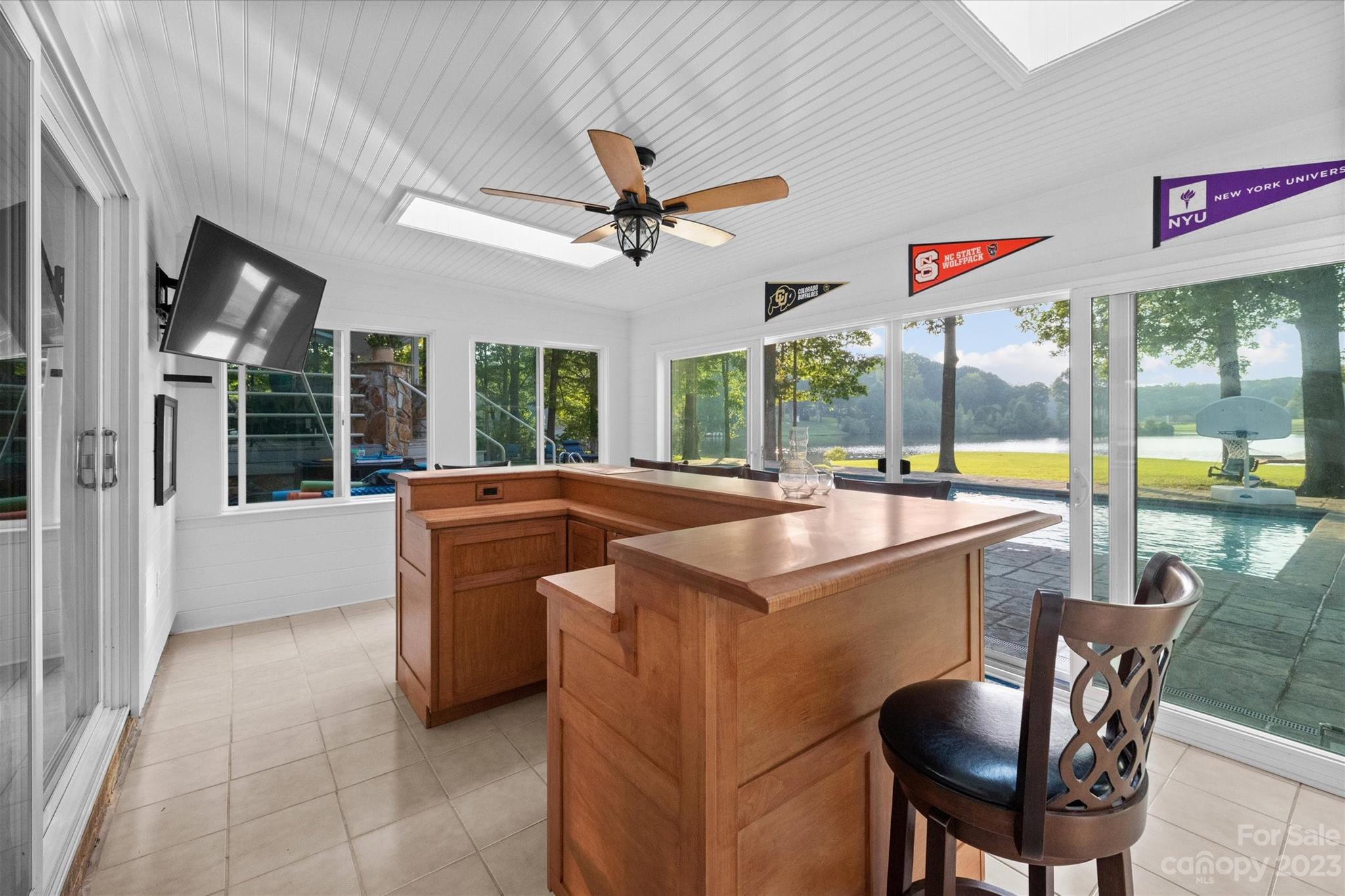 766 Eagle Road Waxhaw, NC 28173 - Photo 31 of 45 a view of a kitchen with granite countertop a sink and a refrigerator