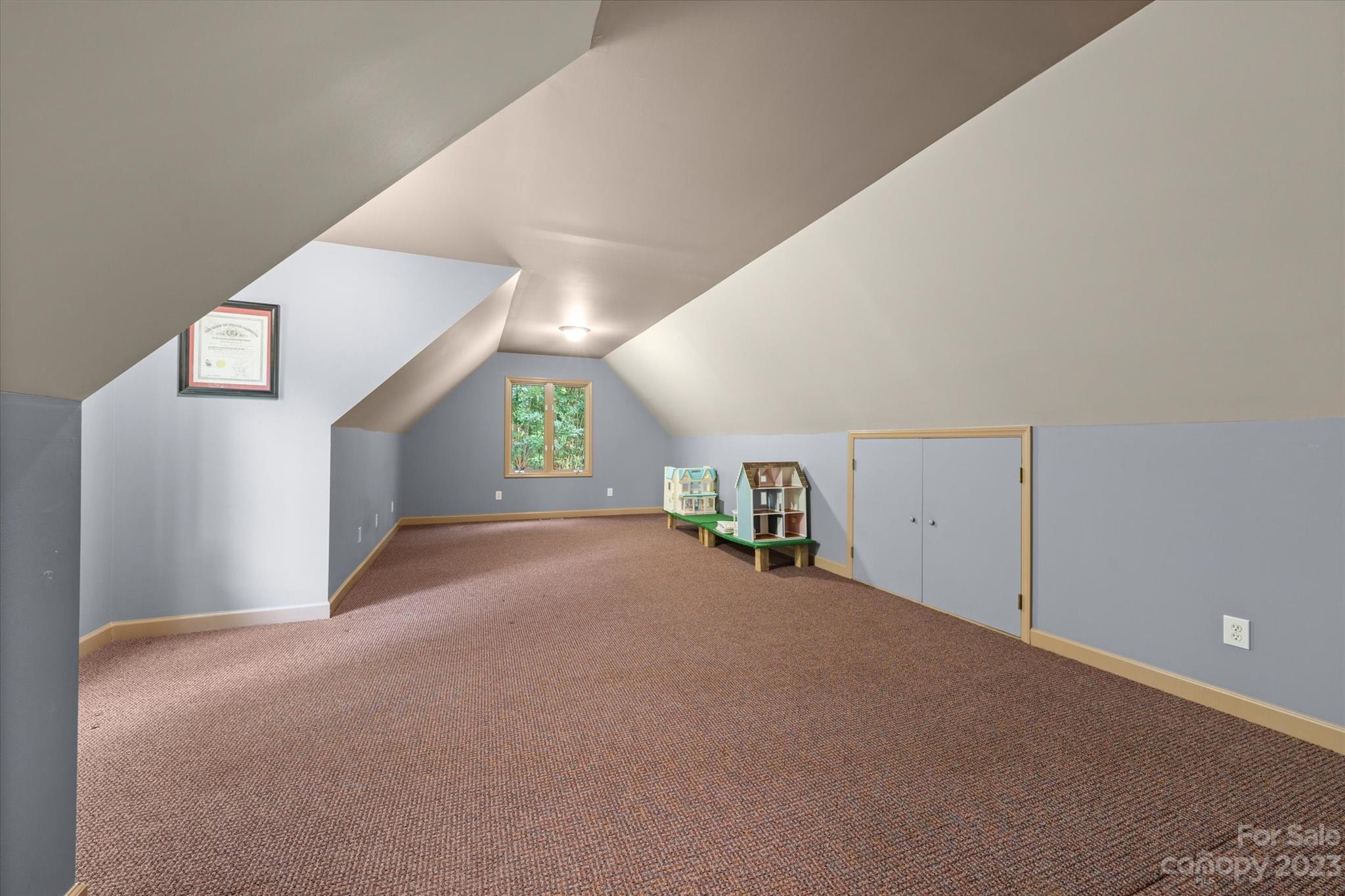 766 Eagle Road Waxhaw, NC 28173 - Photo 39 of 45 a view of a big room with closet and windows