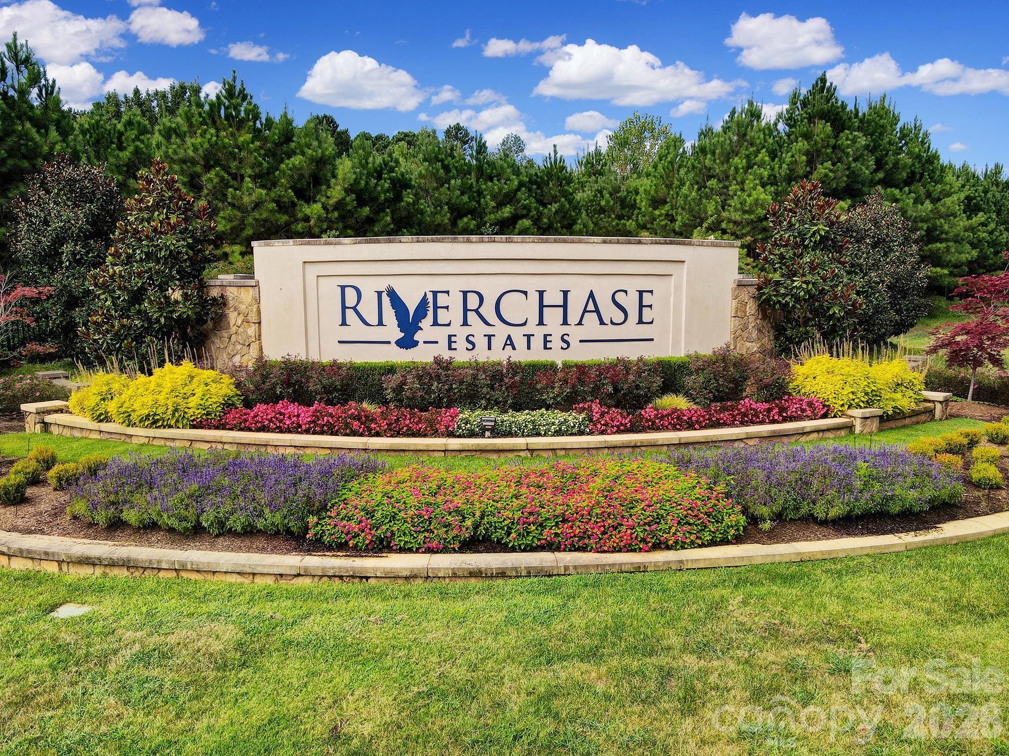4079 Persimmon Road Lancaster, SC 29720 - Photo 3 of 14 a view of a sign board with flower garden