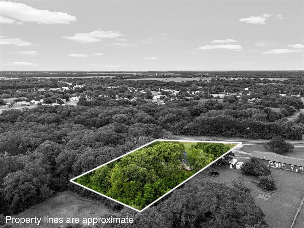 4704 Williams Road Bellmead, TX 76705 - Photo 30 of 32 Aerial view highlighting a rectangular lot with mature trees