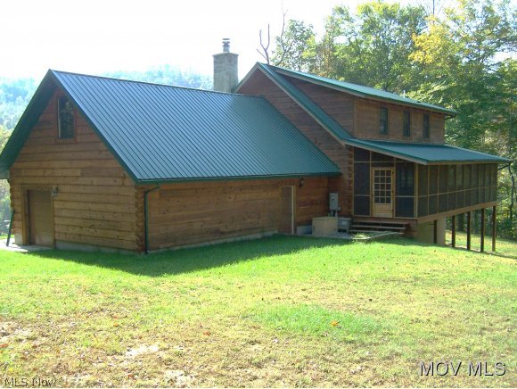 3067 Munday Road Elizabeth, WV 26143 - Photo 3 of 23 Back of garage & house view