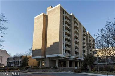 a front view of a building with street view