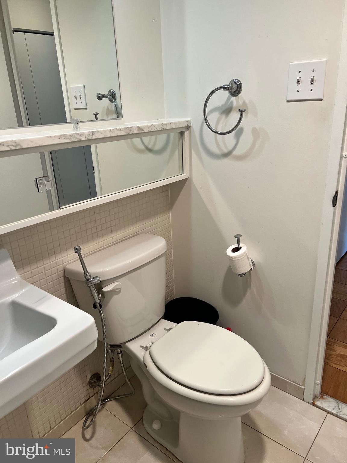 429 N Street Southwest, Unit S301 Washington, DC 20024 - Photo 17 of 19 a bathroom with a toilet and a sink