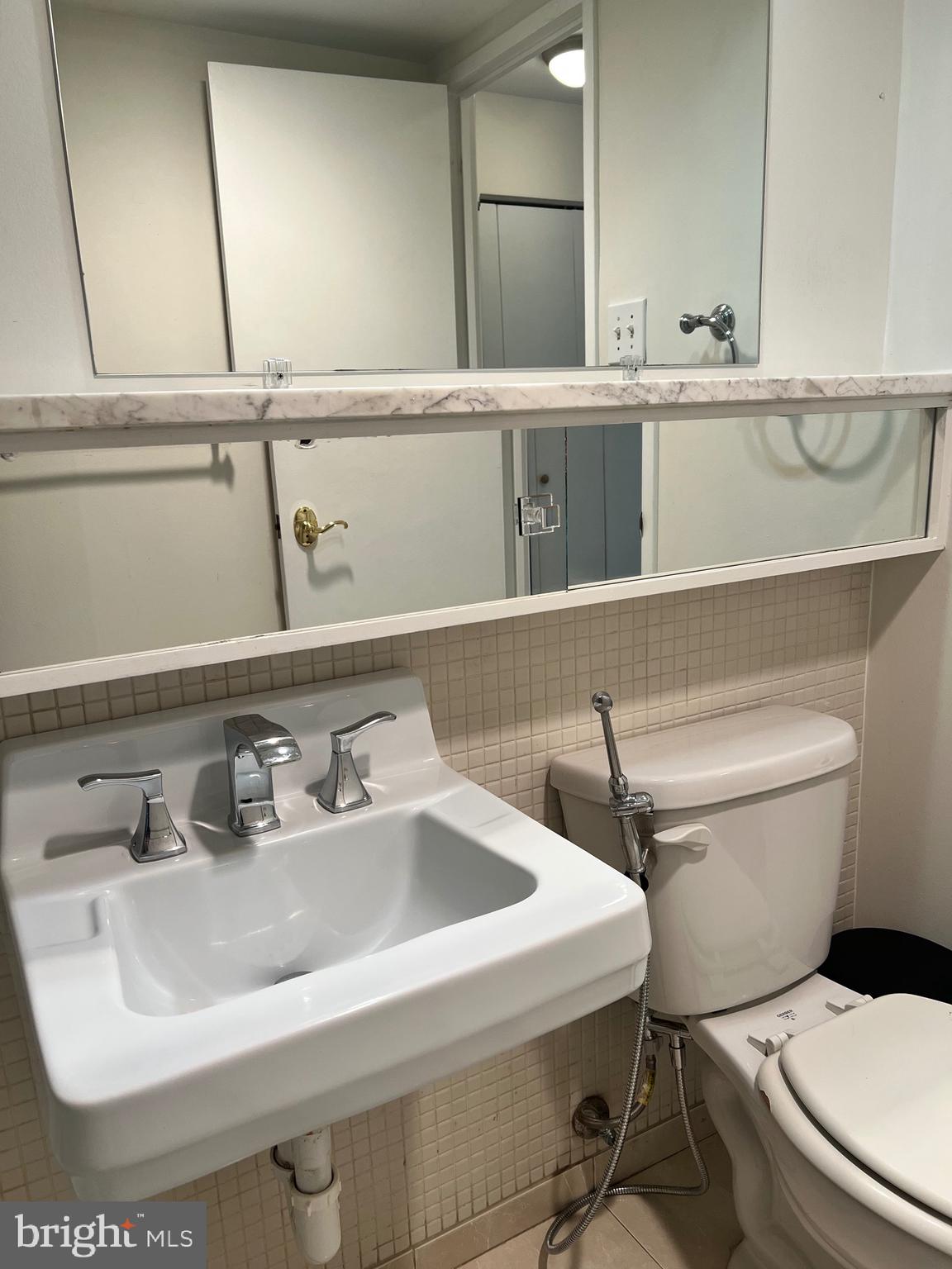 429 N Street Southwest, Unit S301 Washington, DC 20024 - Photo 18 of 19 a bathroom with a sink and a toilet