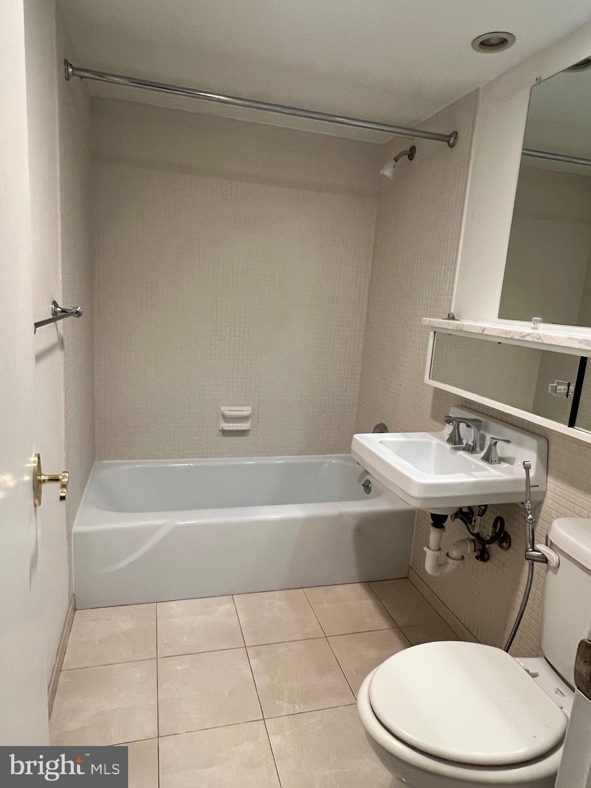 429 N Street Southwest, Unit S301 Washington, DC 20024 - Photo 19 of 19 a bathroom with a sink a toilet and bathtub