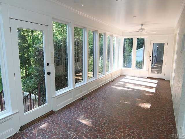 6616 Pleasant Pines Drive Raleigh, NC 27613 - Photo 12 of 15 Sunroom off back of home overlooking back gardens. Sun Room