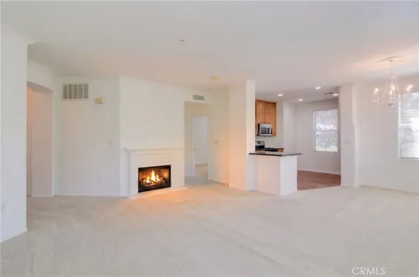 a view of a livingroom with a fireplace