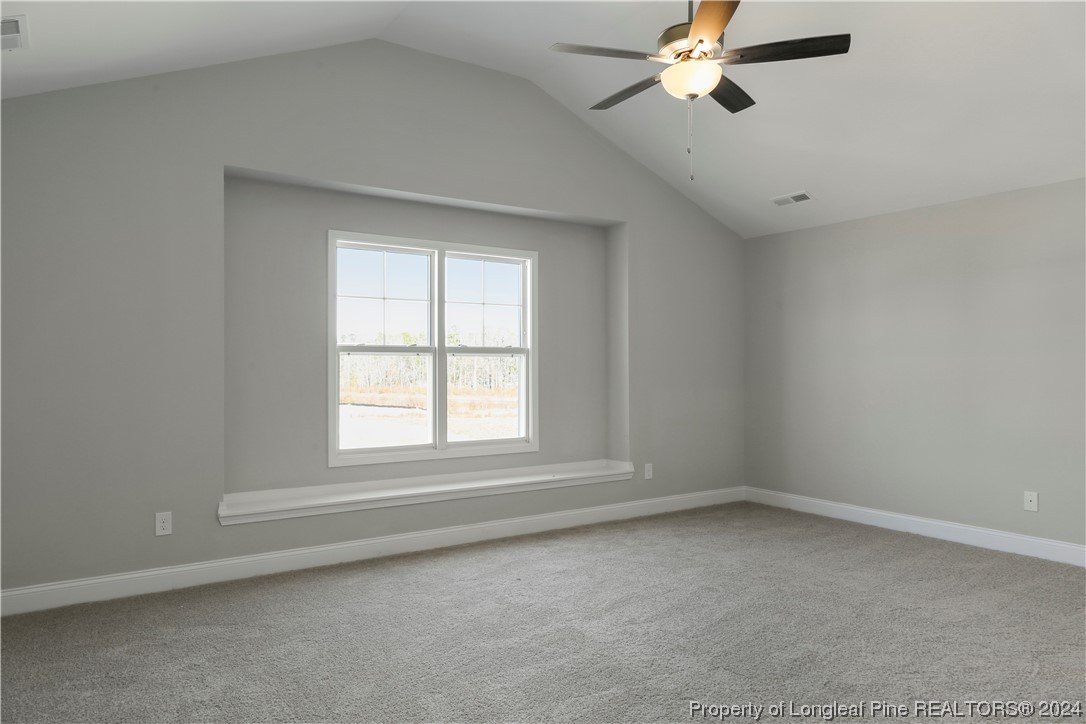 254 Collier Street Linden, NC 28356 - Photo 17 of 34 an empty room with a window
