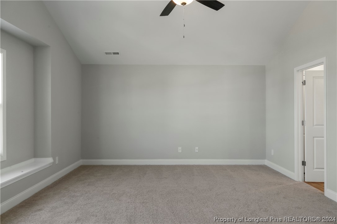 254 Collier Street Linden, NC 28356 - Photo 18 of 34 a view of an empty room