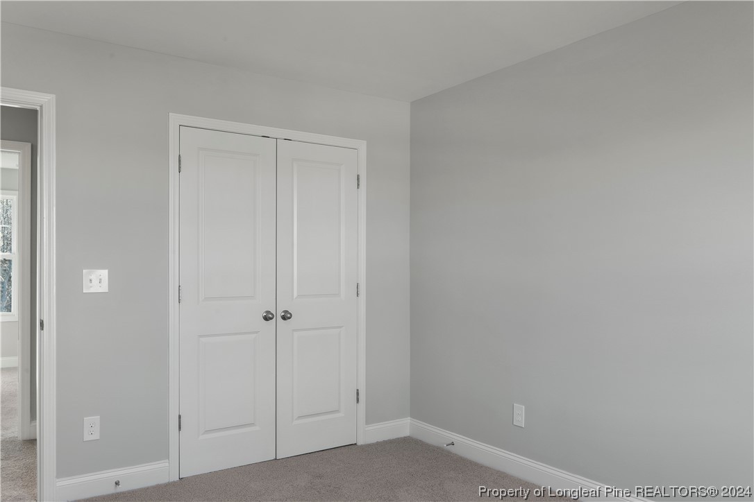 254 Collier Street Linden, NC 28356 - Photo 28 of 34 an empty room with closet