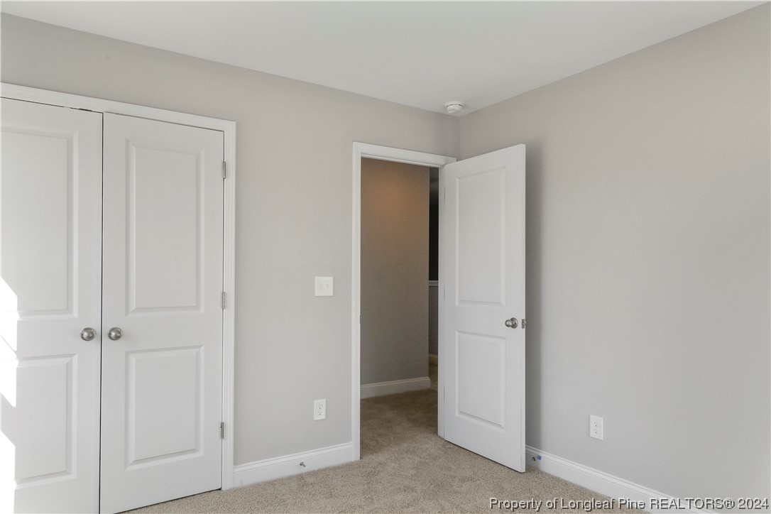254 Collier Street Linden, NC 28356 - Photo 30 of 34 an empty room with closet area
