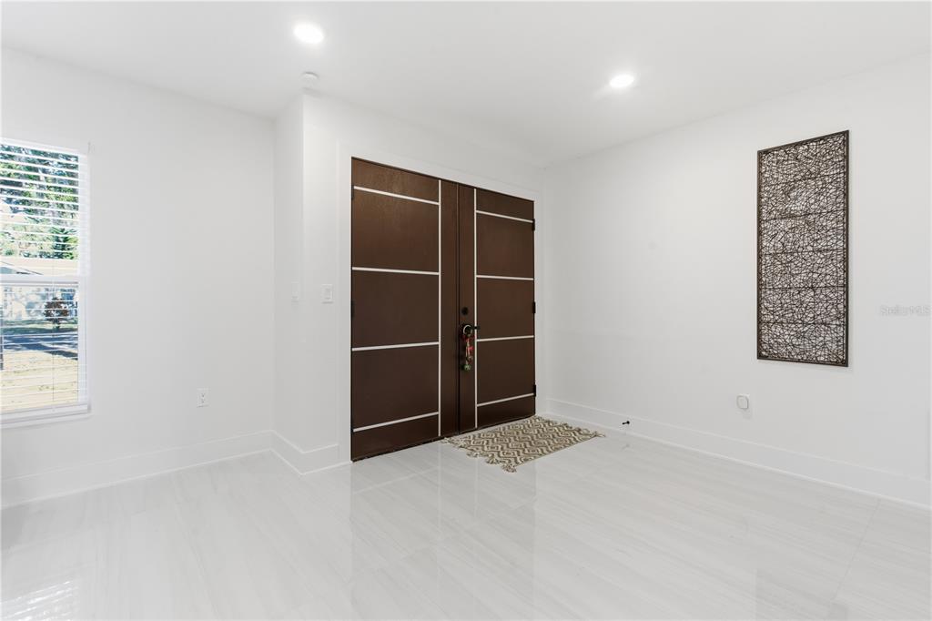 4346 Marine Parkway New Port Richey, FL 34652 - Photo 14 of 51 an empty room with a empty space and window