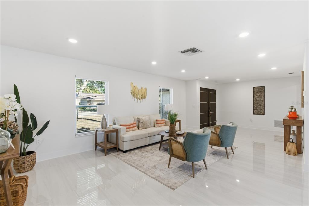 4346 Marine Parkway New Port Richey, FL 34652 - Photo 22 of 51 a living room with furniture and a potted plant