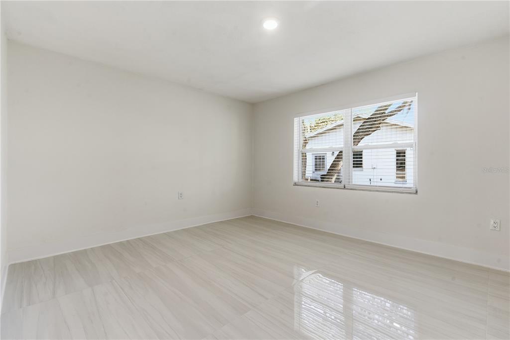 4346 Marine Parkway New Port Richey, FL 34652 - Photo 31 of 51 an empty room with windows