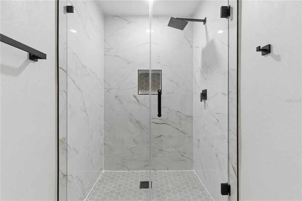 4346 Marine Parkway New Port Richey, FL 34652 - Photo 33 of 51 a bathroom with a shower
